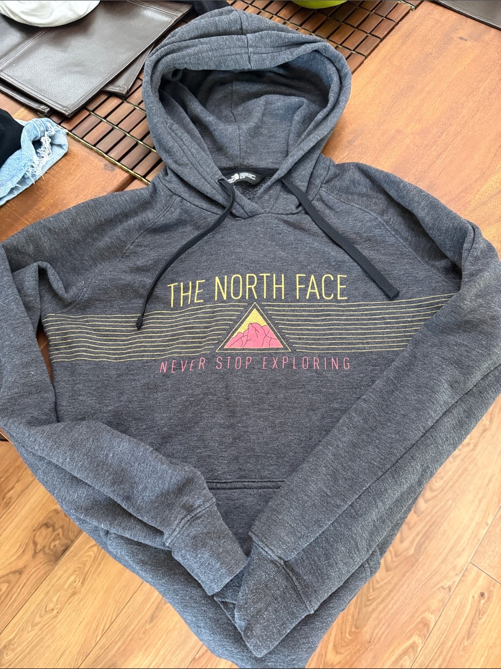 The North Face Charcoal Hoodie with Yellow and Pink Graphic